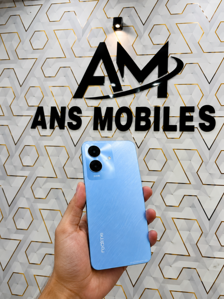 Best Phones Under Rs. 25,000 in Pakistan Realme Note 60 smartphone held in hand at ANS Mobile